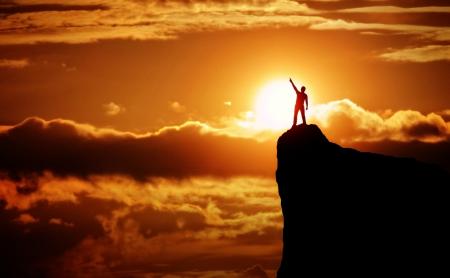 Man on the Top of the Mountain at Sunrise